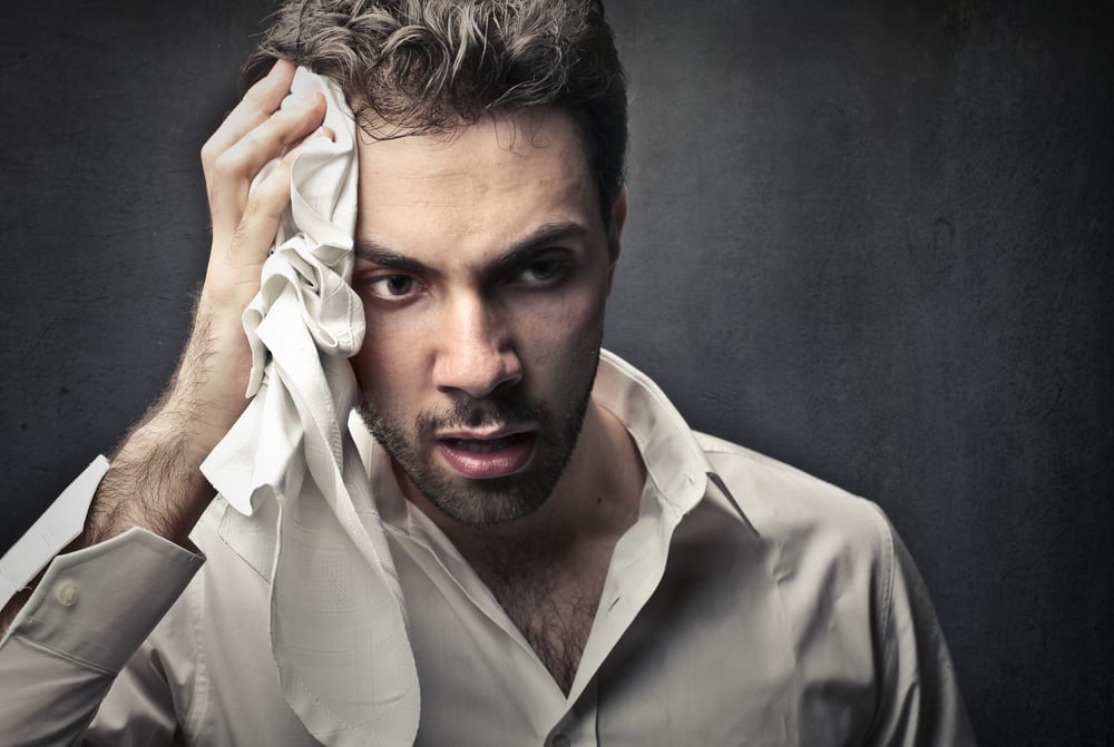 A Man Experiencing Symptoms of Hyperhidrosis in Perth, WA